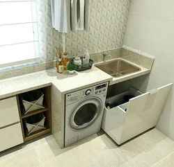 Washing machine with sink in the kitchen photo
