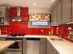 Gray kitchen with red apron photo