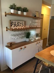 Cabinet above the table in the kitchen photo