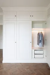 Built-In Wardrobe In The Hallway White Photo