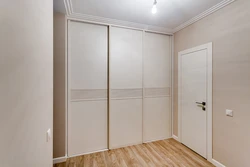 Built-In Wardrobe In The Hallway White Photo