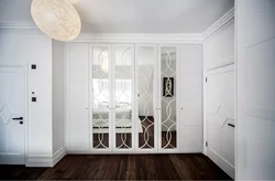 Built-In Wardrobe In The Hallway White Photo