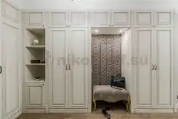 Built-in wardrobe in the hallway white photo