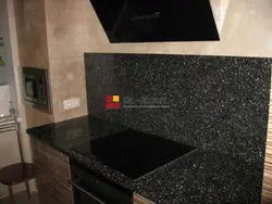 Photo of black artificial stone in the kitchen