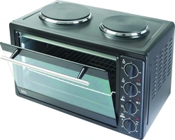 Electric Stove With Oven In The Kitchen Photo