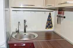 Kitchens with a chimney at the sink photo