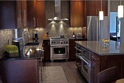 Black and brown kitchens in the interior photo