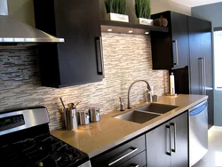 Black And Brown Kitchens In The Interior Photo