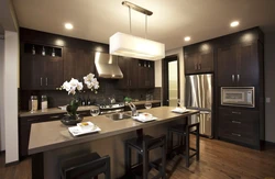 Black And Brown Kitchens In The Interior Photo