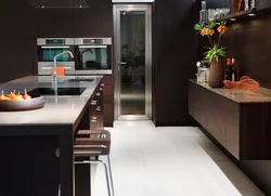 Black and brown kitchens in the interior photo