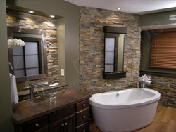 Bathtub with stone panels photo
