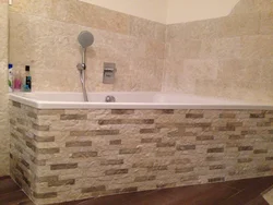Bathtub With Stone Panels Photo