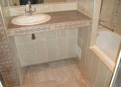 Bathroom cabinet made of tiles photo