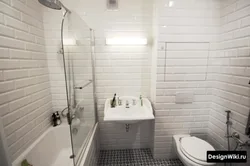 Photo Of A Bathroom With Brick Panels