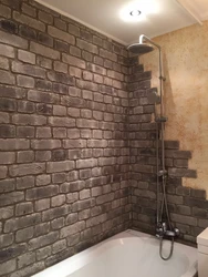 Photo Of A Bathroom With Brick Panels