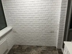 Фото ванной с панелями под кирпич