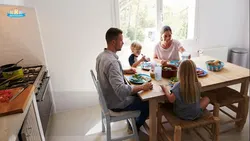 Family at the table in the kitchen photo