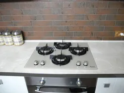 Black gas hob in the kitchen photo