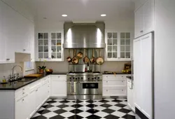 Black and white tiles kitchen floor photo