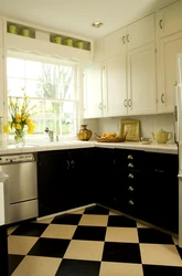 Black and white tiles kitchen floor photo