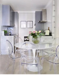 White glass table for the kitchen photo