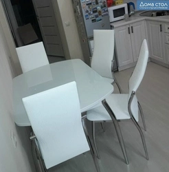 White glass table for the kitchen photo