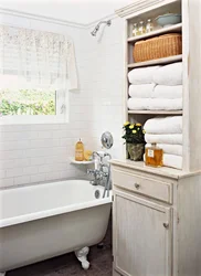 Полотенца в маленькой ванной комнате фото