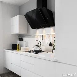 Black inclined hoods in the kitchen photo
