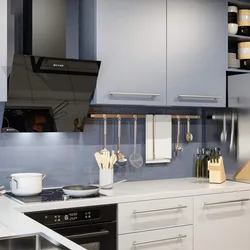 Black inclined hoods in the kitchen photo