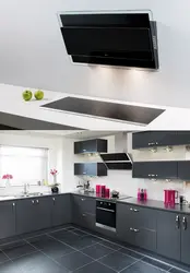 Black inclined hoods in the kitchen photo