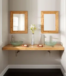 Wooden countertop in the bathroom photo design