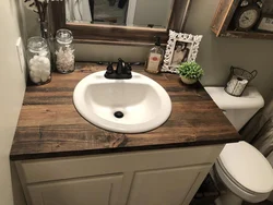 Wooden countertop in the bathroom photo design