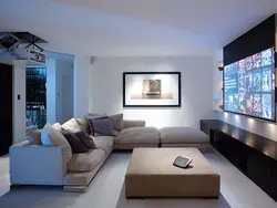 Living Room With Only A Sofa And TV Photo