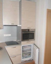 Photo of refrigerator and oven in the kitchen