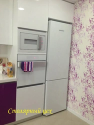 Photo of refrigerator and oven in the kitchen