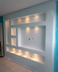 Built-in shelves in the wall in the bedroom photo