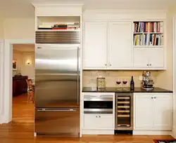 Photo of a refrigerator in the kitchen in one line