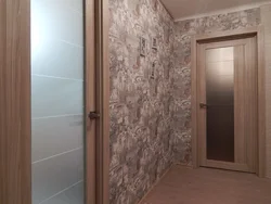 Wallpaper in the hallway with brown doors photo