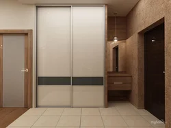 Built-in two-door wardrobes in the hallway photo