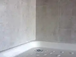 Bathtub made of marbled PVC panels photo