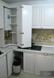 Kitchen With Gas Boiler And Refrigerator Photo