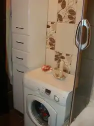 Washing machine case in the bathroom photo