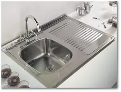 Overhead kitchen sinks made of stainless steel photo