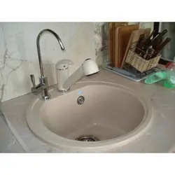 Kitchen faucet made of artificial stone photo