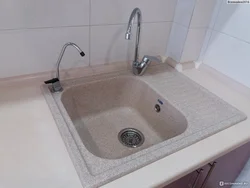 Kitchen faucet made of artificial stone photo