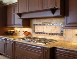 Apron and countertop in the kitchen tiles photo