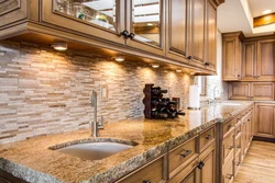 Apron and countertop in the kitchen tiles photo