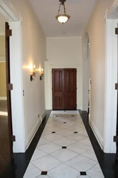 Light tiles in the kitchen and hallway photo