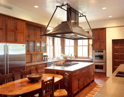 Kitchen Hood In A Wooden House Photo