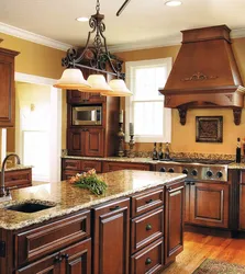 Kitchen hood in a wooden house photo